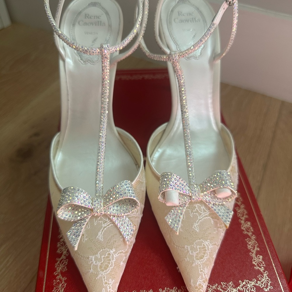 Rene Caovilla Lace Cream Heels with Rhinestone Bow
